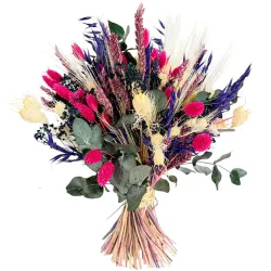 Ramo de flores preservado con tonos rojos, azules y blancos.
