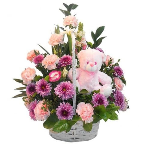 Centro de flores variado con peluches para bebés recién nacidos