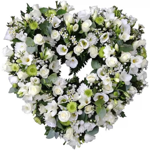 Corazón de flores para funerales en Madrid.