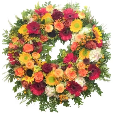 Flores a tanatorio M30 en Madrid. Corona funeraria.